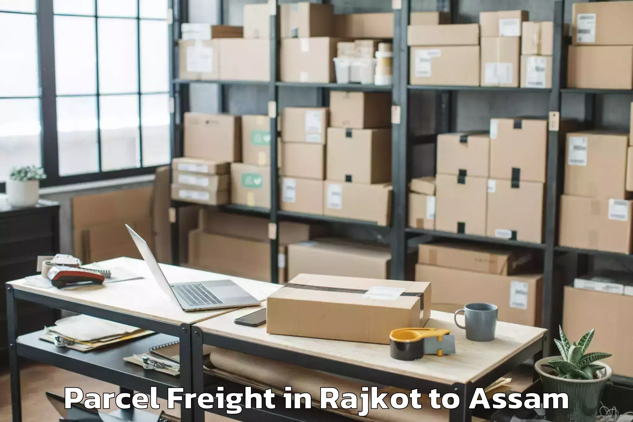 Book Rajkot to Darangamela Parcel Freight Online